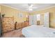 Primary bedroom showcasing wood furniture and a large window providing natural light at 44449 Oriole Dr # 101, Indian Land, SC 29707