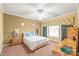 Comfortable bedroom with soft carpet, neutral walls, and large windows with natural light at 44449 Oriole Dr # 101, Indian Land, SC 29707