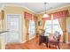 Cozy breakfast nook with lots of natural light from large windows and decorative window coverings at 44449 Oriole Dr # 101, Indian Land, SC 29707