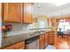 Well-appointed kitchen featuring stainless steel appliances, granite countertops, and ample storage space at 44449 Oriole Dr # 101, Indian Land, SC 29707