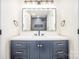Stylish bathroom vanity with modern fixtures, dual sinks and decorative lighting at 4907 Ardenwoods Dr, Charlotte, NC 28215