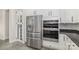 Modern kitchen with stainless steel refrigerator and oven appliances at 4907 Ardenwoods Dr, Charlotte, NC 28215