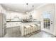 Stylish kitchen with white cabinets, granite counters, and stainless steel appliances at 4907 Ardenwoods Dr, Charlotte, NC 28215