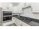 Contemporary kitchen design with granite countertops and sleek stainless steel appliances at 4907 Ardenwoods Dr, Charlotte, NC 28215
