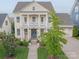 Inviting two-story home featuring a classic front porch and well-manicured lawn at 5250 Meadowcroft Way, Fort Mill, SC 29708