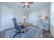 Comfortable office with hardwood floors, white trim, and an office chair at 5250 Meadowcroft Way, Fort Mill, SC 29708