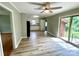 Open kitchen and dining area featuring modern vinyl floors, and stainless-steel appliances at 601 Scottsbrook Dr, Charlotte, NC 28213