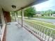 Inviting covered porch offers great neighborhood views at 601 Scottsbrook Dr, Charlotte, NC 28213