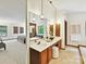 Vanity area features a view to the soaking tub in the primary bath with dual vanities and ample counter space at 6017 Lake Providence Ln, Charlotte, NC 28277