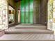 Inviting front entrance featuring double doors, stone accents, and a welcoming porch area at 6017 Lake Providence Ln, Charlotte, NC 28277