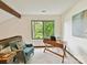 Bright office with natural light, desk, and comfortable chair, ideal for a productive work environment at 6017 Lake Providence Ln, Charlotte, NC 28277