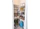 Organized pantry with wire shelves and various storage containers at 6114 Paw Village Rd, Charlotte, NC 28214