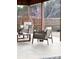 Cozy covered patio with stylish outdoor furniture, perfect for relaxing and entertaining guests at 6114 Paw Village Rd, Charlotte, NC 28214