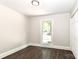 Bright bedroom with hardwood floors, closet and large window at 6409 Pineburr Ct, Charlotte, NC 28211