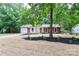 All brick home with manicured landscaping and an attached garage, offering curb appeal at 6409 Pineburr Ct, Charlotte, NC 28211