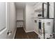 Storage room includes shelving and water heater at 6409 Pineburr Ct, Charlotte, NC 28211