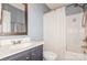 Clean bathroom featuring shower-tub combination and light blue walls at 7128 Rock Bass Ct, Concord, NC 28025