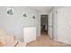Bedroom with a changing table and wall decor at 7128 Rock Bass Ct, Concord, NC 28025