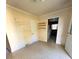 The living room features storage, fresh paint, and tiled flooring at 716 E Union St, Marshville, NC 28103