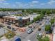 An aerial view of a brick commercial building with street parking showing its prime location with easy access at 804 Lyndon Station Dr, Pineville, NC 28134