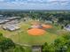 Aerial view of a baseball field showcasing its layout and green spaces, ideal for sports and recreation at 804 Lyndon Station Dr, Pineville, NC 28134
