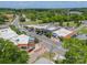 Aerial view of downtown commercial buildings on tree-lined streets, displaying the town's retail and community center at 804 Lyndon Station Dr, Pineville, NC 28134