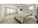 Spacious bedroom featuring large windows for natural light and an installed wall mounted TV at 804 Lyndon Station Dr, Pineville, NC 28134