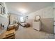 Charming bedroom featuring two twin beds, a decorative chandelier, and wallpaper at 804 Lyndon Station Dr, Pineville, NC 28134