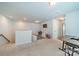 Large bonus room with fun polka-dot accent wall and carpeted flooring at 804 Lyndon Station Dr, Pineville, NC 28134