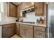 Close up of the kitchen showing stainless steel appliances, granite countertops, and tiled backsplash at 804 Lyndon Station Dr, Pineville, NC 28134