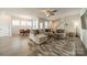 Spacious living room features a sectional sofa, modern decor, and an open layout at 804 Lyndon Station Dr, Pineville, NC 28134
