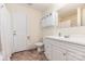 Clean bathroom featuring a white vanity, toilet, and a shower with a white curtain at 814 Independence Dr, Wingate, NC 28174