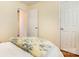 Bedroom includes carpeted floors and bright walls with a double door closet at 814 Independence Dr, Wingate, NC 28174