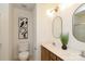 Bright bathroom with dual sinks, modern fixtures and stylish decor at 8233 Christmas Ct, Charlotte, NC 28216