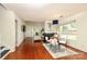 Cozy dining room with fireplace, and a large window to let in sunlight at 8233 Christmas Ct, Charlotte, NC 28216