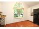 Bright kitchen with stainless steel appliances and a large window at 8233 Christmas Ct, Charlotte, NC 28216