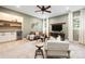 Cozy living room with wet bar, comfortable seating, recessed lighting, and ceiling fan at 9013 Yellow Pine Ct, Waxhaw, NC 28173