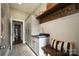 Mudroom with bench, storage, and a convenient sink perfect for a busy Gathering at 9013 Yellow Pine Ct, Waxhaw, NC 28173