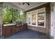 Outdoor kitchen equipped with a grill, cabinetry, and ample counter space at 9013 Yellow Pine Ct, Waxhaw, NC 28173