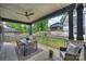 Covered back porch with outdoor dining area, perfect for relaxation and entertaining with view at 910 Everett Pl, Charlotte, NC 28205