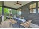 Cozy covered patio features outdoor seating and dining, ideal for enjoying the outdoor scenery at 910 Everett Pl, Charlotte, NC 28205
