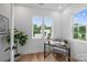 Inviting home office with natural light and modern decor, perfect for productivity and focus at 910 Everett Pl, Charlotte, NC 28205