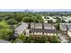 An aerial view showcasing the townhome community surrounded by green trees at 926 Steel House Blvd, Charlotte, NC 28205