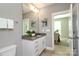 Bathroom showcasing vanity with granite countertop and view to dining room at 926 Steel House Blvd, Charlotte, NC 28205