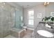 Modern bathroom featuring a glass shower, double granite vanity, and ample lighting at 926 Steel House Blvd, Charlotte, NC 28205