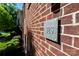 Exterior brick detail of a property with the address 926 on a sign at 926 Steel House Blvd, Charlotte, NC 28205