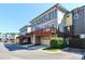 Modern townhome exterior featuring garage, deck and neutral toned siding at 926 Steel House Blvd, Charlotte, NC 28205