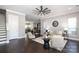 Open-concept living area showcasing hardwood floors and a glimpse into the dining area at 926 Steel House Blvd, Charlotte, NC 28205