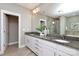 Main bathroom with double vanity, granite countertops, and a separate tub and shower at 926 Steel House Blvd, Charlotte, NC 28205