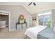 Spacious main bedroom with a vaulted ceiling and balcony, offering plenty of natural light at 926 Steel House Blvd, Charlotte, NC 28205